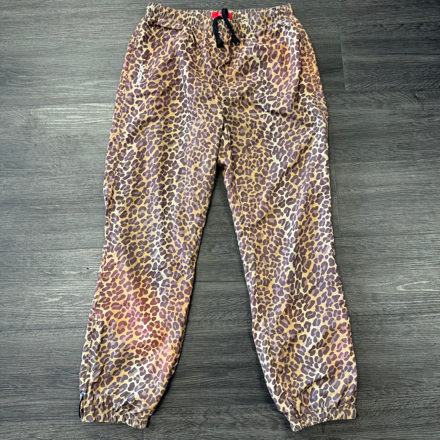 Supreme Leopard Track Pants